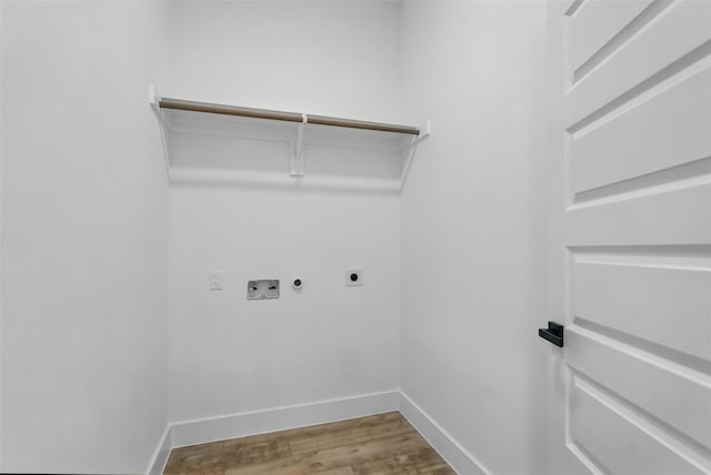2910 Brigham Ln, Dallas, TX 75215 - laundry room featuring electric dryer hookup, washer hookup, wood finished floors, and hookup for a gas dryer