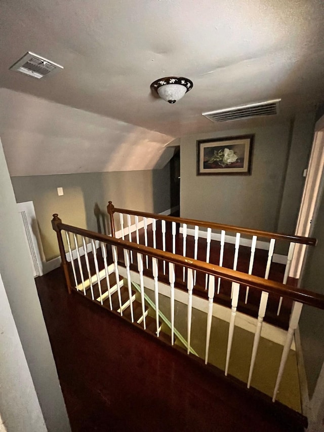 1612 Lagonda Ave, Fort Worth, TX 76164 - staircase with vaulted ceiling and baseboards