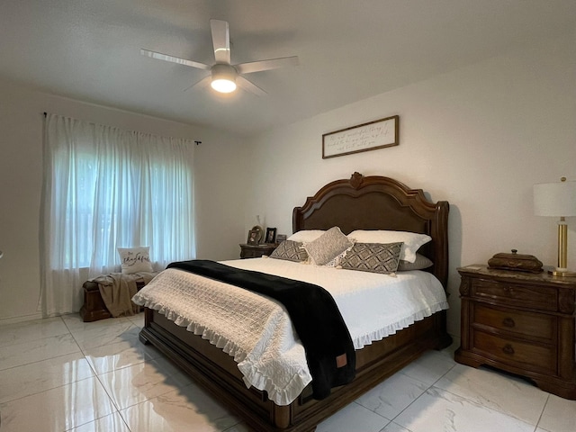 1603 Pacific Ave, Ennis, TX 75119 - bedroom with light marble finish flooring and a ceiling fan