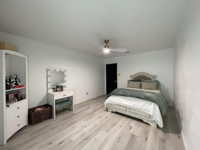 1603 Pacific Ave, Ennis, TX 75119 - bedroom featuring light wood-style floors and ceiling fan
