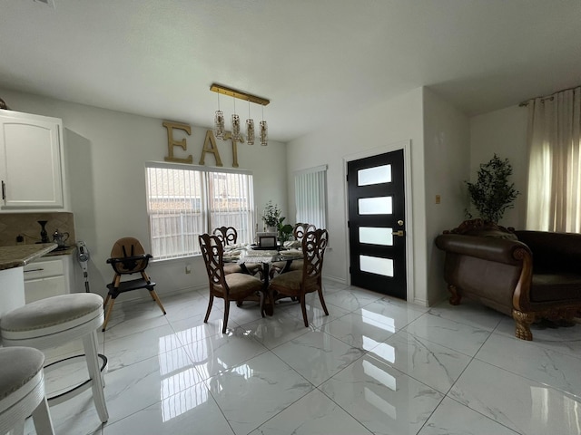 1603 Pacific Ave, Ennis, TX 75119 - dining room with light marble finish floors