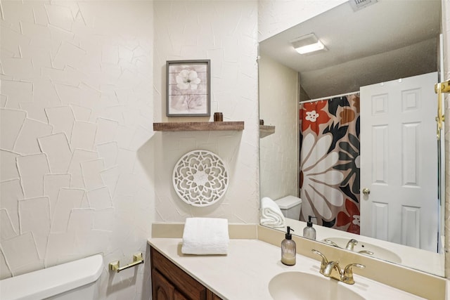 2531 Stanford Ct, Carrollton, TX 75006 - bathroom featuring vanity and curtained shower