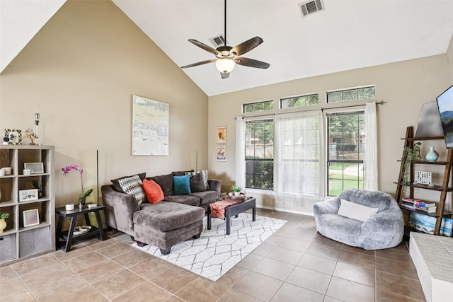 2531 Stanford Ct, Carrollton, TX 75006 - living area with high vaulted ceiling, ceiling fan, and light tile patterned floors