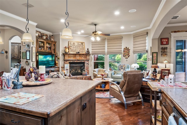 513 Hearth Ter, Argyle, TX 76226 - kitchen with arched walkways, recessed lighting, dark wood-type flooring, crown molding, and ceiling fan