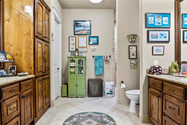 513 Hearth Ter, Argyle, TX 76226 - bathroom with tile patterned flooring and vanity