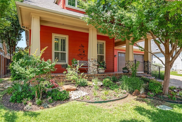 513 Hearth Ter, Argyle, TX 76226 - view of exterior entry featuring covered porch and a shingled roof
