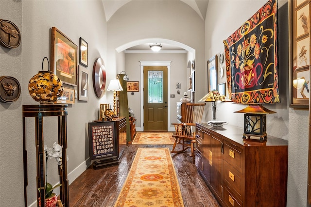 513 Hearth Ter, Argyle, TX 76226 - entrance foyer with arched walkways, crown molding, and dark wood finished floors