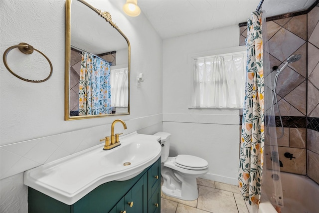 3829 Byers Ave, Fort Worth, TX 76107 - bathroom with vanity, shower / bath combo with shower curtain, and tile patterned floors