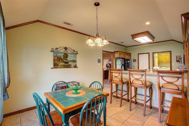 1813 Ranch Rd, Royse City, TX 75189 - dining room featuring vaulted ceiling, light tile patterned floors, ornamental molding, a chandelier, and recessed lighting