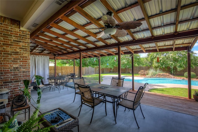 1813 Ranch Rd, Royse City, TX 75189 - fenced backyard with outdoor dining area, ceiling fan, a deck, and a patio