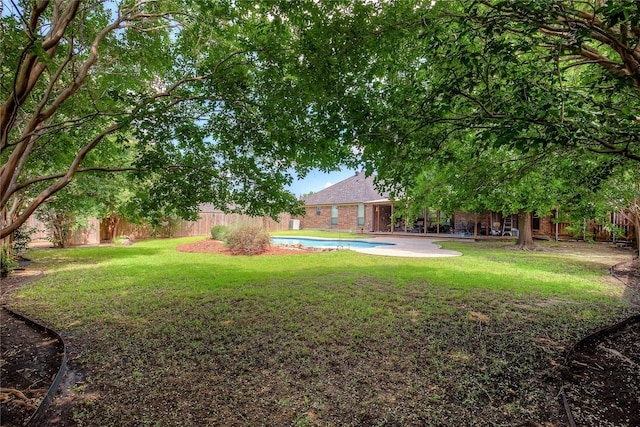1813 Ranch Rd, Royse City, TX 75189 - fenced backyard with a patio
