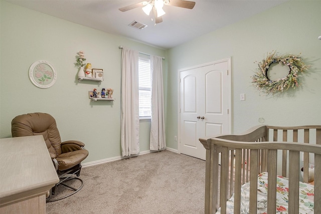 1148 Blue Sky Ln, Burleson, TX 76058 - bedroom with carpet floors, a nursery area, and a ceiling fan
