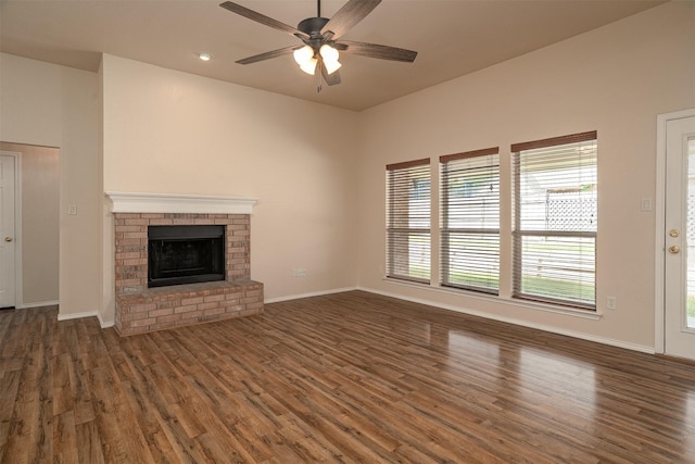 302 Howard Way Dr, Aledo, TX 76008 - unfurnished living room with wood finished floors, a ceiling fan, and a fireplace