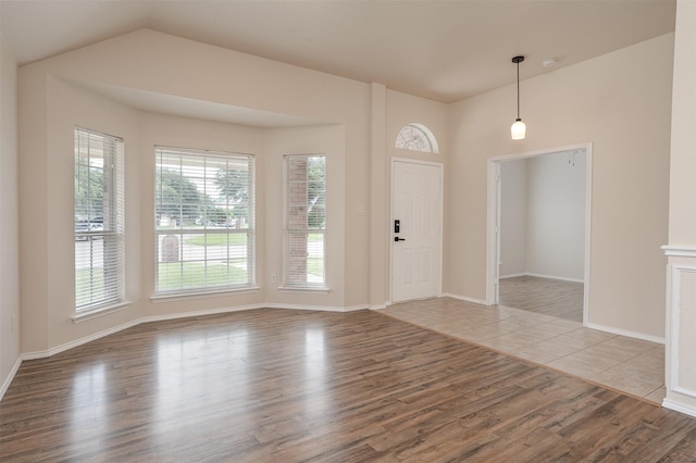 302 Howard Way Dr, Aledo, TX 76008 - entrance foyer featuring plenty of natural light, wood finished floors, and lofted ceiling