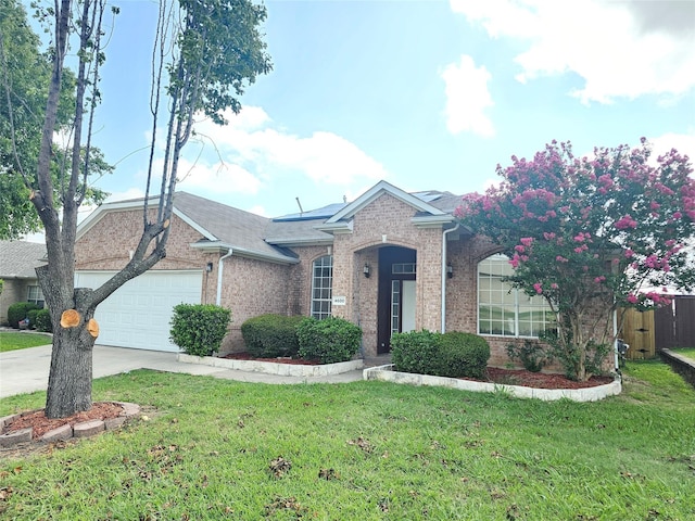 4600 Via Ventura, Mesquite, TX 75150 - ranch-style house with brick siding, an attached garage, driveway, and a shingled roof