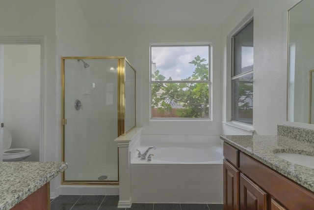 4600 Via Ventura, Mesquite, TX 75150 - full bathroom with vanity, a shower stall, tile patterned floors, and a bath