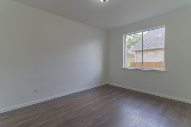 4600 Via Ventura, Mesquite, TX 75150 - spare room featuring dark wood-type flooring and baseboards