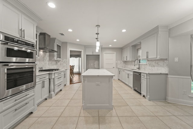 2205 Le Mans Dr, Carrollton, TX 75006 - kitchen with appliances with stainless steel finishes, wall chimney range hood, tasteful backsplash, light tile patterned floors, and recessed lighting