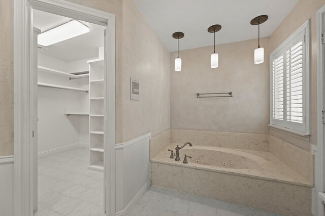 2205 Le Mans Dr, Carrollton, TX 75006 - full bath with a tub with jets and a spacious closet