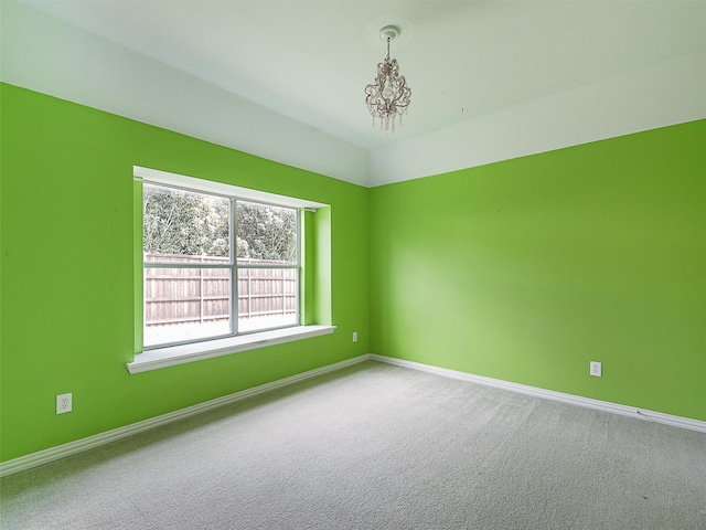 800 Rock Hill Rd, Prosper, TX 75078 - carpeted empty room featuring baseboards and a chandelier