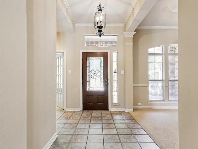 800 Rock Hill Rd, Prosper, TX 75078 - entrance foyer with a chandelier, ornamental molding, and stone tile floors