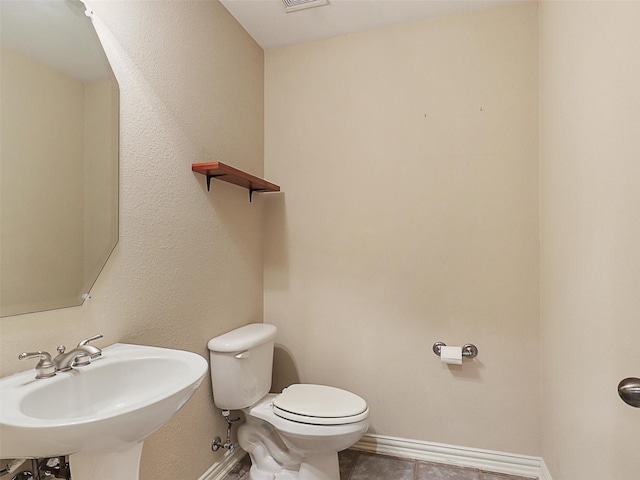 800 Rock Hill Rd, Prosper, TX 75078 - half bathroom featuring a sink and tile patterned floors
