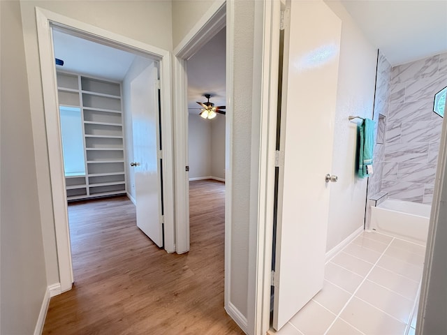 8525 Clearcreek Cir, Frisco, TX 75034 - hallway featuring built in features and wood finished floors