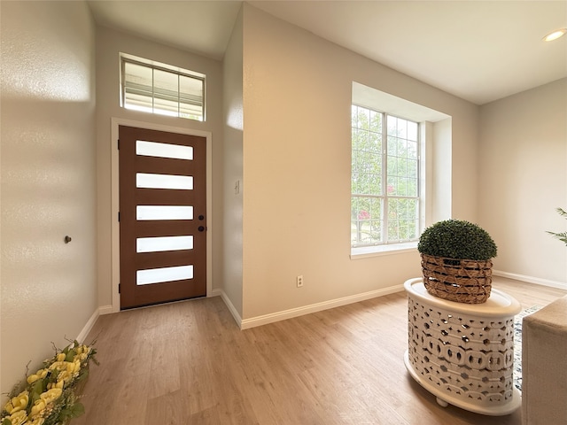 8525 Clearcreek Cir, Frisco, TX 75034 - foyer entrance featuring light wood-style floors and recessed lighting
