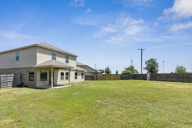 313 Pimlico Way, Ponder, TX 76259 - fenced backyard featuring a patio