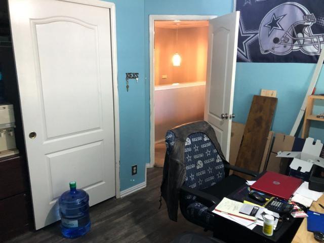 2542 Dove Crossing Dr, New Braunfels, TX 78130 - home office with wood finished floors and baseboards