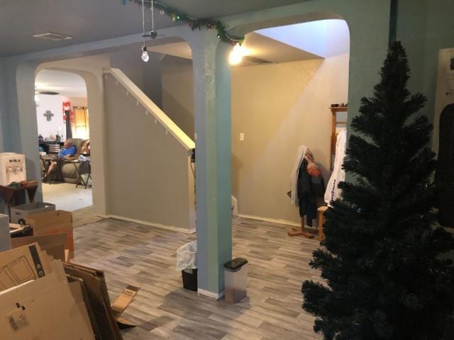 2542 Dove Crossing Dr, New Braunfels, TX 78130 - basement with arched walkways and stairway