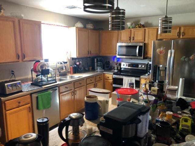2542 Dove Crossing Dr, New Braunfels, TX 78130 - kitchen with stainless steel appliances and light countertops