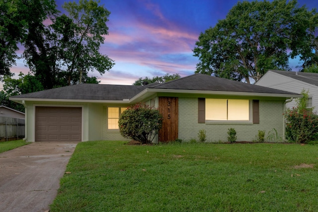 315 Ratcliff, Shreveport, LA 71104 - ranch-style house featuring concrete driveway, a garage, and brick siding