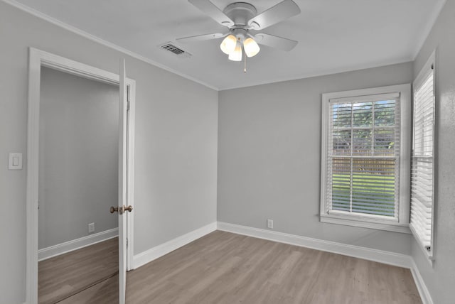 315 Ratcliff, Shreveport, LA 71104 - empty room featuring wood finished floors, a ceiling fan, and ornamental molding