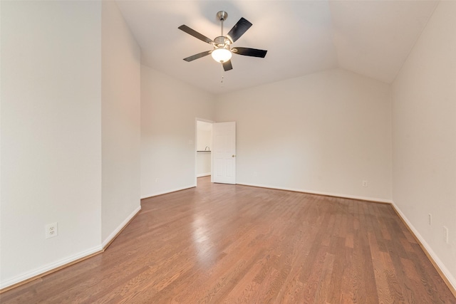 3032 Silver Springs Ln, Plano, TX 75025 - empty room featuring a ceiling fan, wood finished floors, and vaulted ceiling