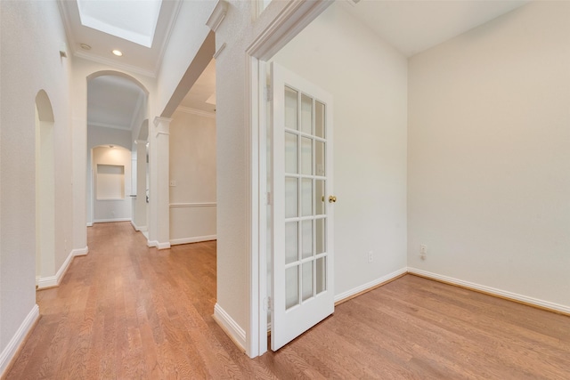 3032 Silver Springs Ln, Plano, TX 75025 - corridor with arched walkways, wood finished floors, decorative columns, and ornamental molding