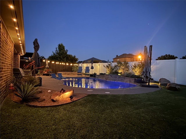 6513 Deer Horn Dr, Fort Worth, TX 76179 - pool at night featuring a fenced backyard and a patio