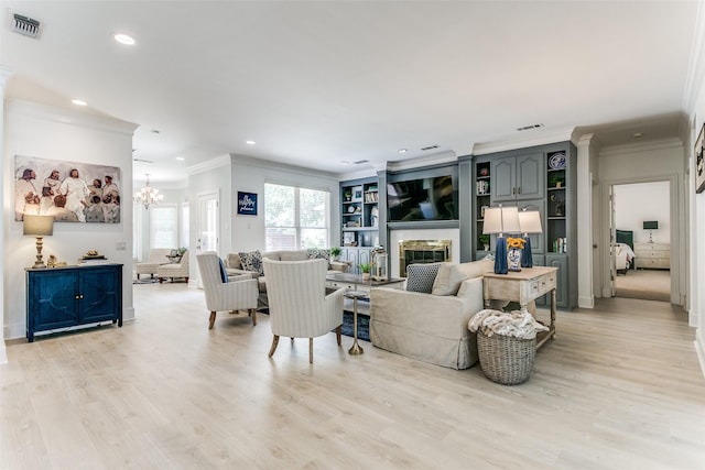 3816 Shady Meadow Dr, Grapevine, TX 76051 - living area featuring ornamental molding, a glass covered fireplace, a chandelier, recessed lighting, and light wood-type flooring