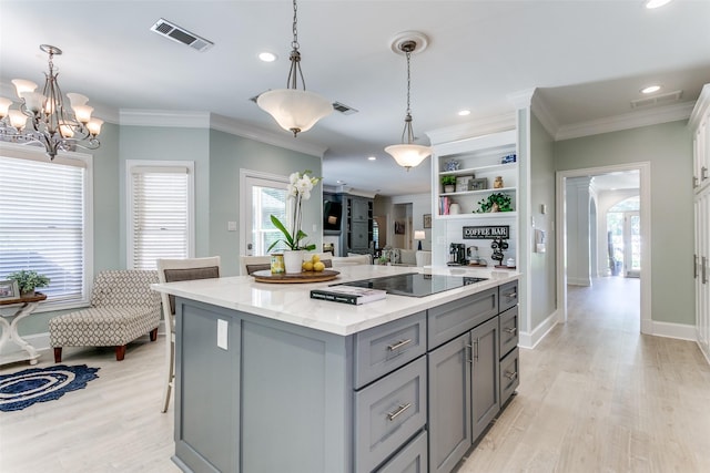 3816 Shady Meadow Dr, Grapevine, TX 76051 - kitchen featuring gray cabinets, black electric stovetop, recessed lighting, light wood-style floors, and ornamental molding