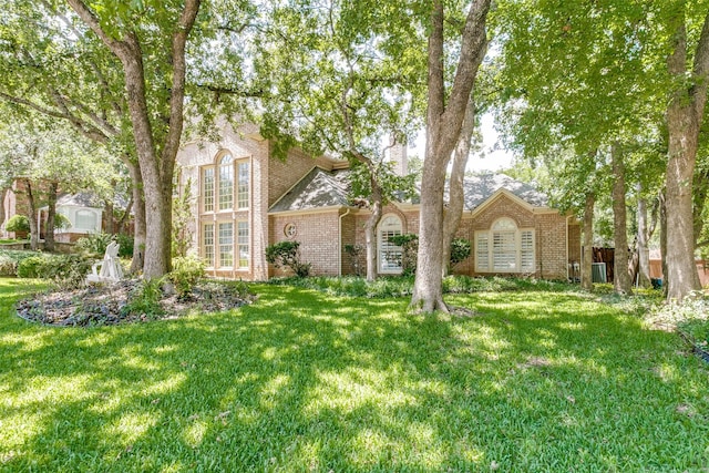 3816 Shady Meadow Dr, Grapevine, TX 76051 - view of front facade with brick siding and a front lawn