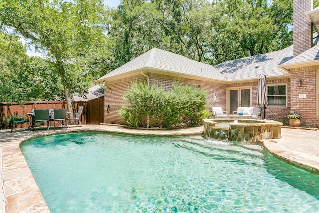 3816 Shady Meadow Dr, Grapevine, TX 76051 - view of pool featuring a patio, a pool with connected hot tub, and outdoor dining space