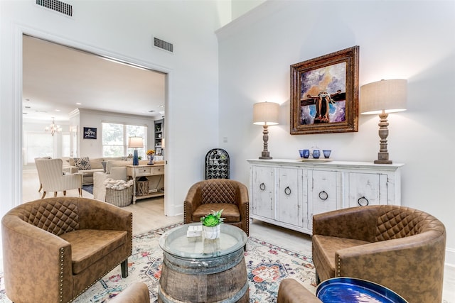 3816 Shady Meadow Dr, Grapevine, TX 76051 - living area featuring a chandelier, wood finished floors, and crown molding