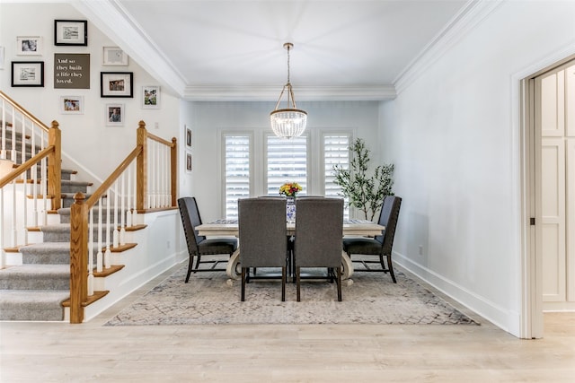 3816 Shady Meadow Dr, Grapevine, TX 76051 - dining area with a chandelier, stairs, crown molding, and wood finished floors
