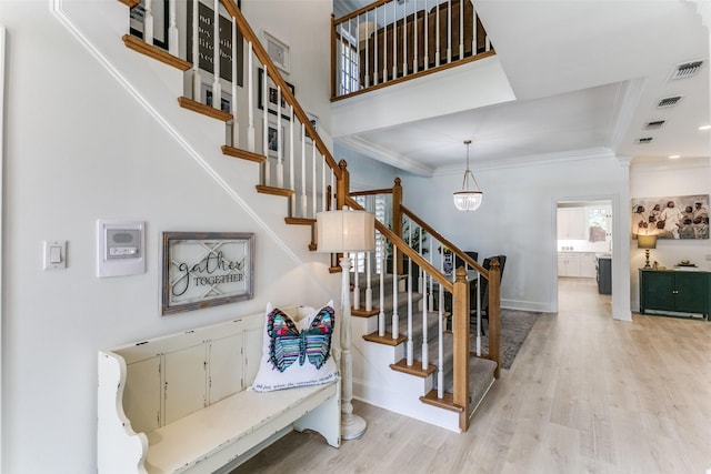 3816 Shady Meadow Dr, Grapevine, TX 76051 - staircase featuring wood finished floors and crown molding