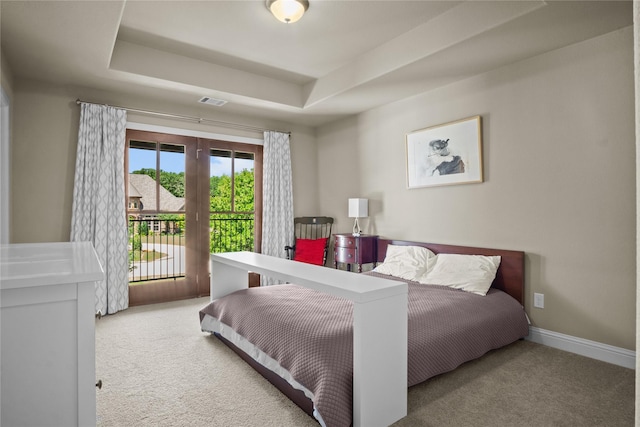 6901 Hickory Hill Cir, Argyle, TX 76226 - carpeted bedroom with access to outside and a tray ceiling