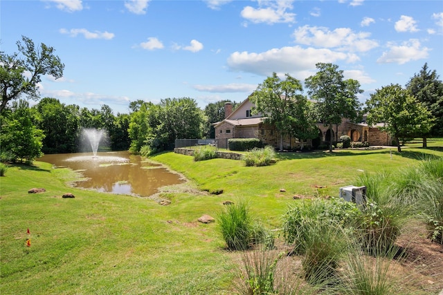 6901 Hickory Hill Cir, Argyle, TX 76226 - view of grassy yard featuring a water view