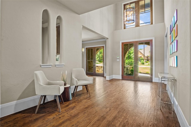 6901 Hickory Hill Cir, Argyle, TX 76226 - foyer entrance featuring healthy amount of natural light, wood finished floors, and french doors