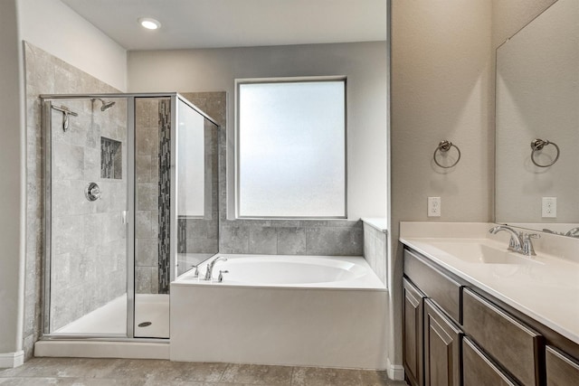 601 Redding Dr, Saginaw, TX 76131 - full bathroom with a bath, a shower stall, and vanity