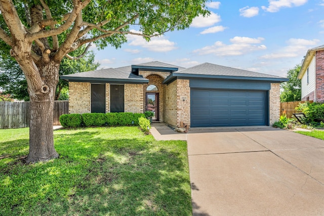 3413 Westfork Ranch Rd, Fort Worth, TX 76262 - view of front facade with brick siding, concrete driveway, a garage, and a shingled roof
