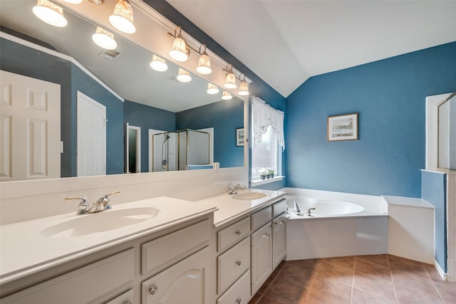 1306 Glendover Dr, Allen, TX 75013 - full bathroom with vaulted ceiling, a stall shower, double vanity, a bath, and tile patterned floors